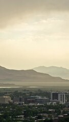 Wall Mural - Vertical Time lapse of storm blowing rain and dust through the City of Provo during summer monsoon in Utah.
