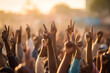 © Real Stuff - many people make victory sign by raise their hand in the air up only hand clicked