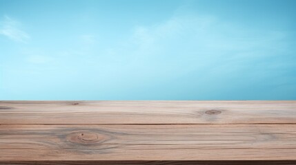 Canvas Print -  a close up of a wooden surface with a blue sky in the backgrounnd of the image and a white cloud in the sky in the background.