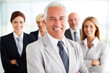 © vefimov - Group of business people standing in line. This image can be used to represent teamwork, collaboration, or corporate setting