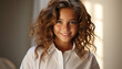 © djvstock - Smiling woman with long curly hair exudes confidence and happiness generated by AI