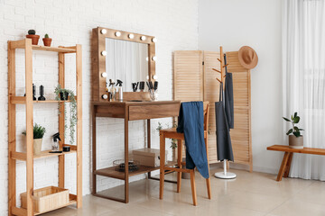 Poster - Interior of beauty salon with stylish table and folding screen