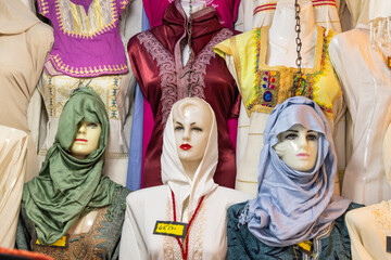 Wall Mural - Mannequins wearing head scarves in the Tunis souk.