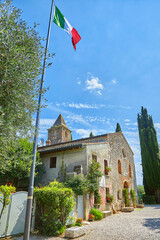 Poster - Beautiful view of the Church of San Pietro in Mavino on Lake Garda in Sirmione, Italy
