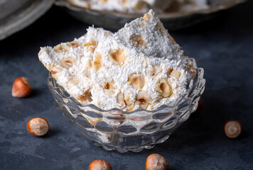 Wall Mural - Traditional delicious Turkish dessert; cezerye with hazelnuts and coconut (Turkish name; Findikli madonna)