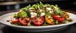 © The 2R Artificiality - In a bright white kitchen, a delicious and healthy appetizer is being prepared - an enticing salad featuring green leafy vegetables, vibrant red tomatoes, white cheese, and fresh fruit, complemented