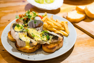 Sticker - Butter bread toast with sea bass fillet in the restaurant