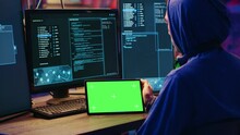 Hackers Doing Computer Sabotage Using Encryption Trojan Ransomware On Green Screen Tablet. Cybercriminals Use Mockup Device To Demand Ransom Money From Victims In Exchange For Access To Their Data