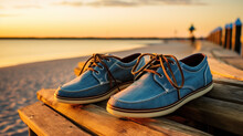 Blue boat shoes on wooden background. Leather shoes. Mens leather shoes. Blue leather shoes. Top-siders outdoors.