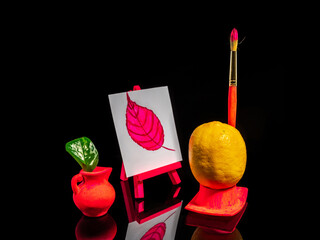 Wall Mural - Composition with lemon at the easel on a black background