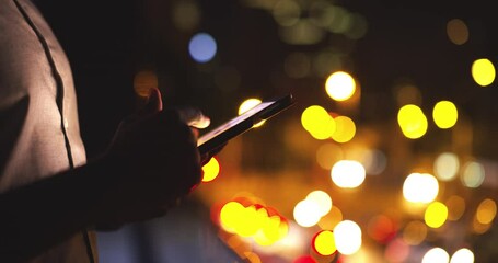 Fototapete - Closeup, night and man with a tablet, business and outdoor with online reading, search internet and typing. Person, employee and entrepreneur with tech, city lights and scroll with email notification