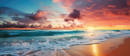 Poster - As the sun slowly sets over the horizon, casting a warm orange glow across the sky, the tranquil beach becomes an ethereal landscape, where the waves crash onto the shore and the shimmering blue sea