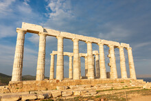 The Temple Of Poseidon On Cape Sounion, Attica, Greece - Ancient Stone Temple With Doric Columns
