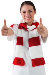 Canvas Print - Digital png photo of happy biracial woman with scarf showing thumbs up on transparent background