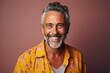 © Merilno - Handsome smiling, happy and pleased man with positive vibes. Human person dressed in fashionable, colorful and fun clothes. Generative AI, AI