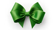 © Moon Project - Green Christmas gift ribbon. Plain white background.