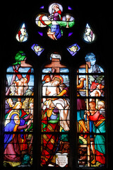 Wall Mural - Sainte Croix (Holy Cross) church, Bernay, Eure, France. Stained glass. Jesus taken down from the cross.