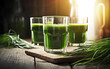 Wheatgrass juice on a blurred background. A healthy drink that can be healthy and function as a detox in the body.