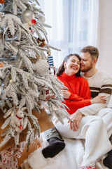 Sticker - beautiful couple near christmas tree