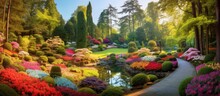 In The Vibrant Summer Garden, A Picturesque Landscape Unfolded, Showcasing A Kaleidoscope Of Colors - From Vivid Red Floral Blooms To Lush Green Leaves - Immersed In The Beauty Of Nature's Artistry
