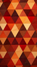 A Geometric Pattern With Triangles In Shades Of Red And Brown