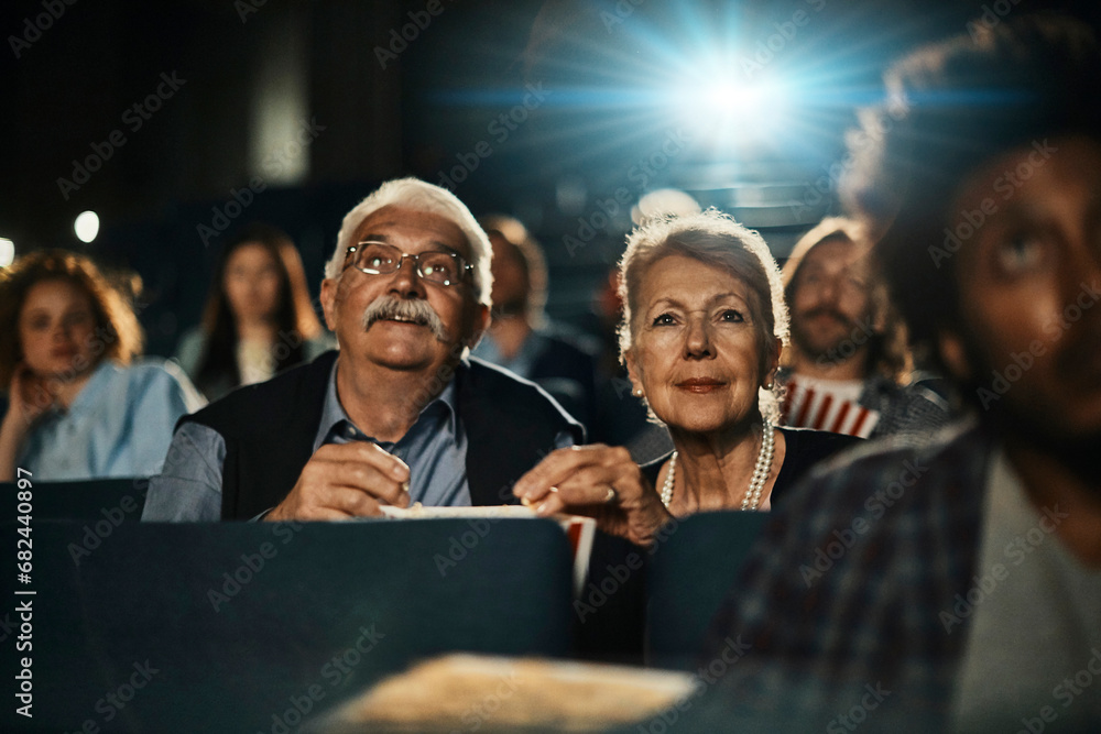 Senior couple in a Movie Theater Stock Photo | Adobe Stock