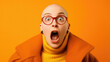 © Synthetica - Shocked funny bald man in glasses and red jacket looking away.
