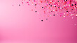 © bornmedia - Falling confetti on bright pink background