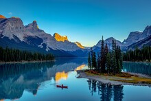 A Tranquil Mountain Lake, Surrounded By Majestic Snow-capped Mountains, Morine Lake Canada