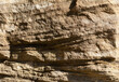 Sandstone. Petrified sand in a quarry. The structure of the stone.