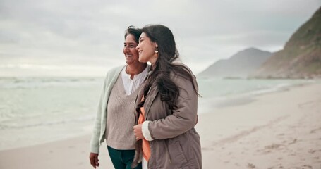 Canvas Print - Beach walk, love and woman with senior mother in nature for bond, trust and care, hug or conversation. Happy family, communication or women at the ocean for travel freedom, support or security at sea