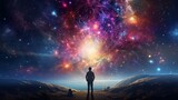 Fototapeta Kosmos - a person standing on a rocky surface looking at a galaxy