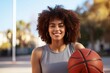 black woman with basketball ball