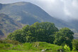 The mountain of Wetherlam towers above the valley of Little Langdale in the Lake District
