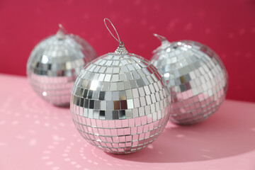 Wall Mural - Beautiful disco balls on a red background