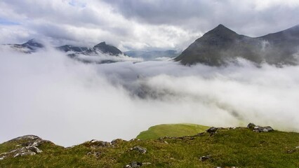 Poster - Time lapse of spectacular mountains and fjords near the village of Funningur in Faroe Islands, Denmark.