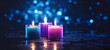 Candles with blue and purple flames, dark background, bokeh, Romantic background, Christmas or New Year composition with burning candles in small glass candlesticks, festive evening
