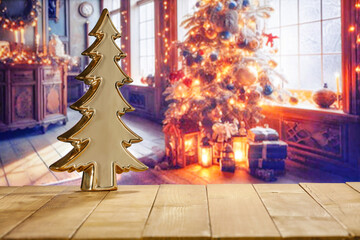 Wall Mural - Wooden retro yellow table and blurred background of window sill. Christmas tree and empty space for your decoration. Natural light and magic time. Mockup background and cold december time.