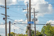 ELECTRICITY PYLON WITH STREET NAME SIGN BROAD AVENUE IN NEW ORLEANS, LOUISIANA