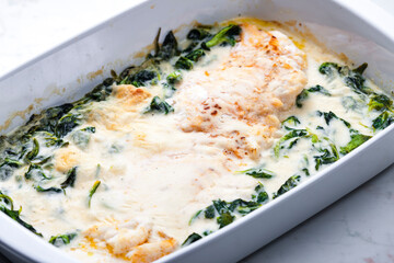 Poster - poultry meet baked with cheese and spinach leaves