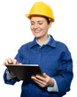 © scharfsinn86 - Isolated smiling woman engineer in yellow helmet and blue uniform with digital tablet