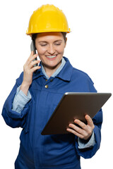 Wall Mural - Isolated smiling woman engineer in yellow helmet and blue uniform with phone and digital tablet	