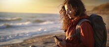Portrait Young Woman Traveler With Backpack And Mobile Phone On The Seashore. AI Generated Image
