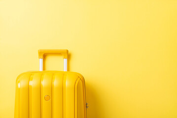 Dreaming of an island escape? Picture it with a top-down view of yellow suitcase on a sandy setting. Customizable space for your travel details