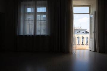 Canvas Print - Interior of an empty dark room with windows