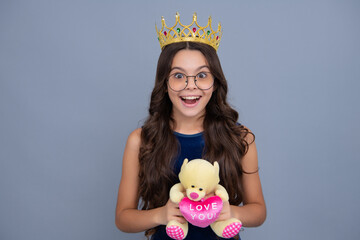 Canvas Print - Girls birthday party, funny kid in crown. Imagine herself a queen, child wear diadem. Successful teenager wear luxury beauty queen crown, success. Excited face, cheerful emotions of teenager girl.