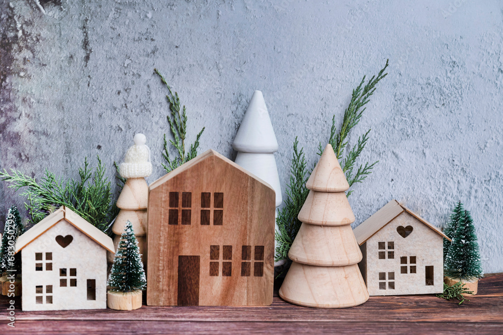 Christmas room interior decoration with wooden small houses and pine ...