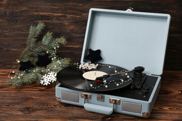 Poster - Vintage turntable with Christmas decorations on wooden background