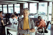 © Davor - Portrait of mature businesswoman standing in office