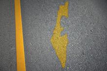 Yellow Map Of Israel Country On Asphalt Road Near Yellow Line.